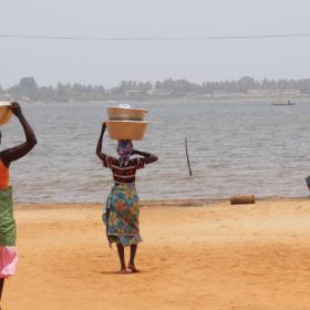 Local women in Togoville with buckets of water